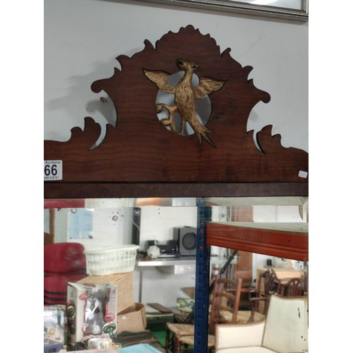 166 - A framed bevel edged mirror with an ornate frame and phoenix to the top, in need of attention. 
Heig... 