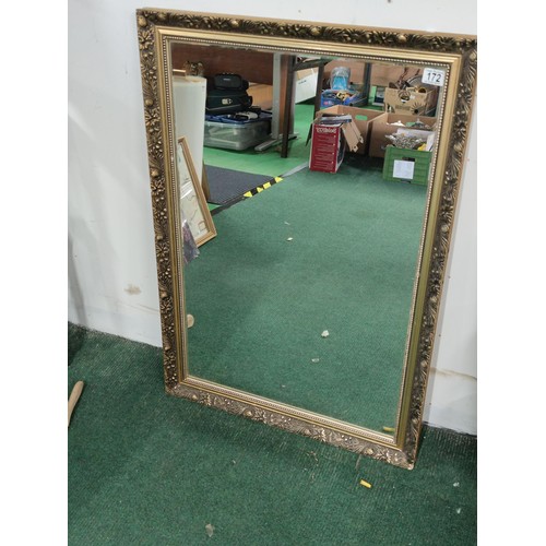 172 - A large gilt framed double edged mirror in overall good condition with floral design to the frame. 
... 