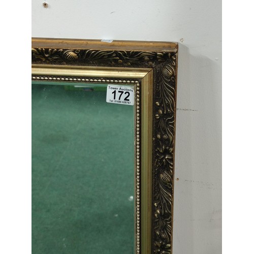 172 - A large gilt framed double edged mirror in overall good condition with floral design to the frame. 
... 