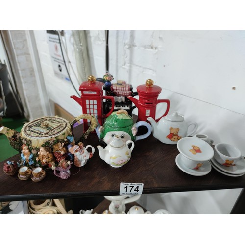 174 - A Large collection of 51 novelty ceramic teapots to include some rare models, a telephone box, post ... 