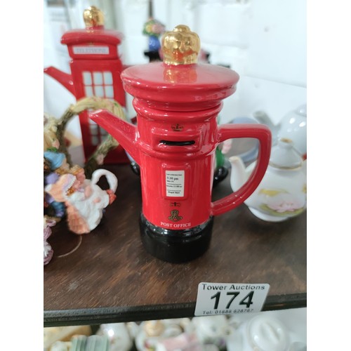 174 - A Large collection of 51 novelty ceramic teapots to include some rare models, a telephone box, post ... 