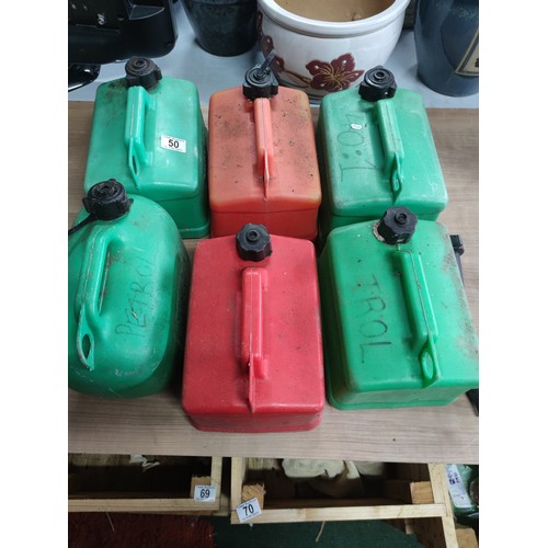 50 - A quantity of six 5l petrol cans (4 green 2 red) along with one nozzle.