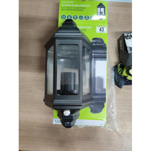 16 - A new in box exterior half lantern motion sensor light along with a new in box guild headtorch 100 l... 