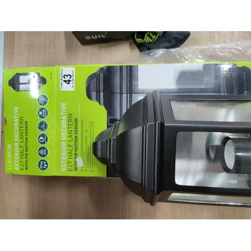 16 - A new in box exterior half lantern motion sensor light along with a new in box guild headtorch 100 l... 