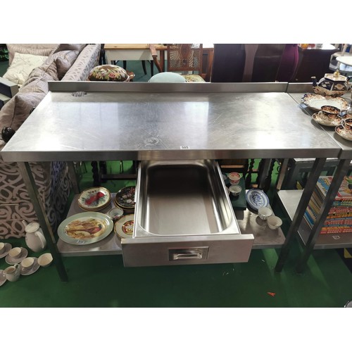 511 - Large stainless steel catering table with shelf to the base and low splash back to the back in very ... 