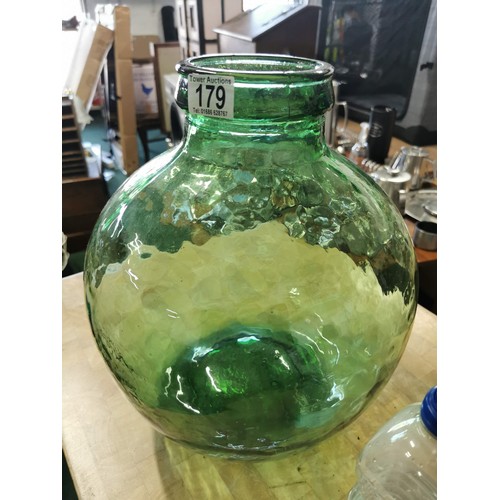 179 - Large green dappled glass carbouyed in good order has no chips or cracks measures 40cm x 30cm