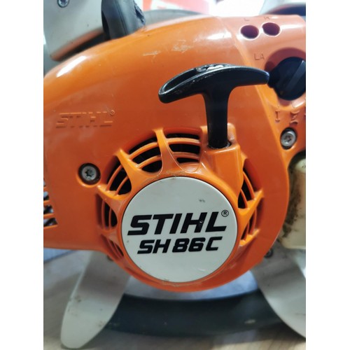 24 - Stihl SH86C leaf blower garden vacuum, mulches, complete with accessories, comes with a box.