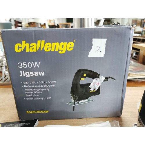 29 - Boxed challenge 350w jigsaw complete with instructions along with a Guild 30 meter laser measure wit... 