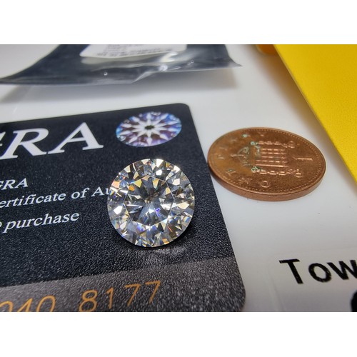 364 - A stunning 6ct moissanite diamond by GRA complete with its full paperwork and grading report. The st... 