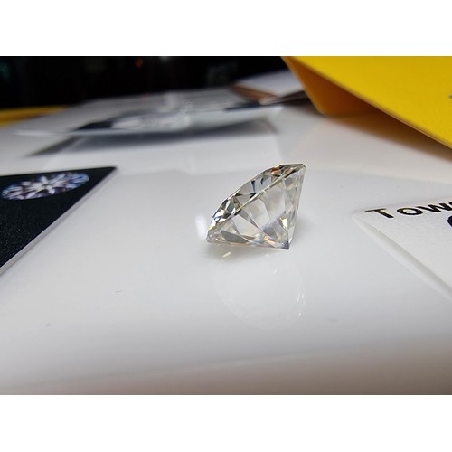 364 - A stunning 6ct moissanite diamond by GRA complete with its full paperwork and grading report. The st... 