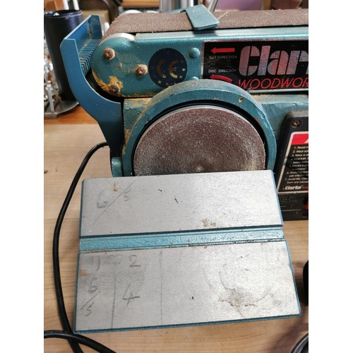 42 - Clarke wood worker belt & disk sander along with spare belts disks sand paper etc belt measures 4in ... 