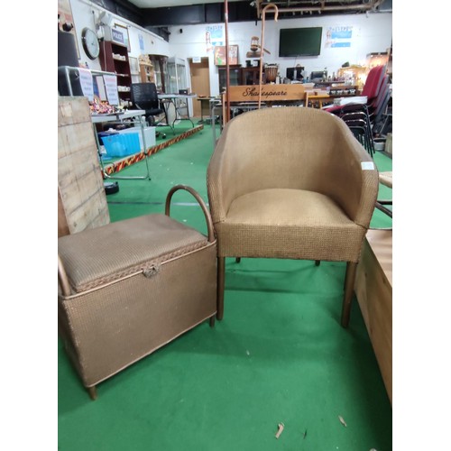 510 - Lloyd loom style chair and linen box in gold finish