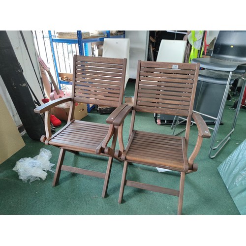 517 - Folding FSC solid teak garden chairs with named badge and in good order