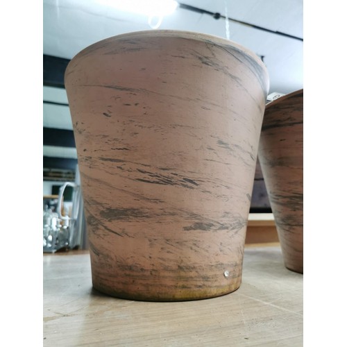 69 - 2x Terracotta plant pots in good order both 31cm diameter and standing 29cm high