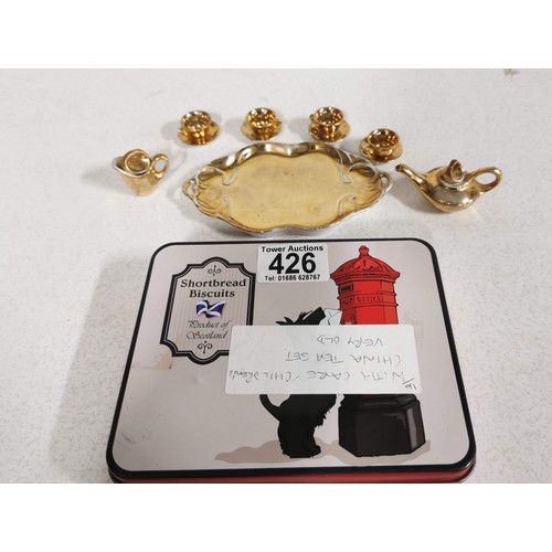 Ceramic gold luster miniature dolls tea set complete with teapot, milk