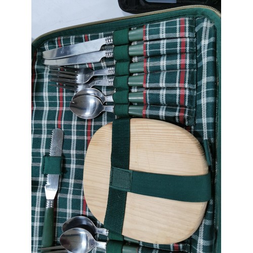 435 - Cased Gelert 4 person tartan picnic hamper complete with serviettes, plates wine glasses and cutlery... 