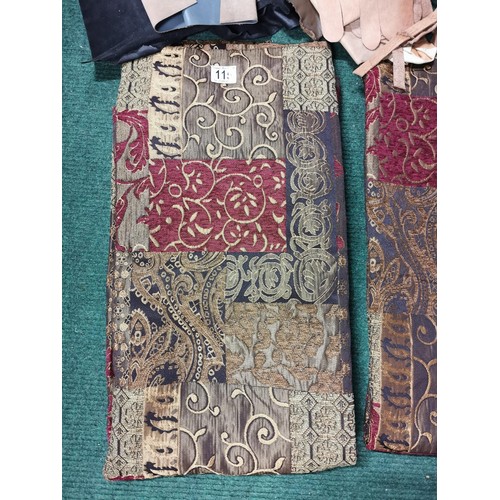 115 - Pair of silk well detailed tudor style 250cm drop curtains along with a bag containing a large quant... 