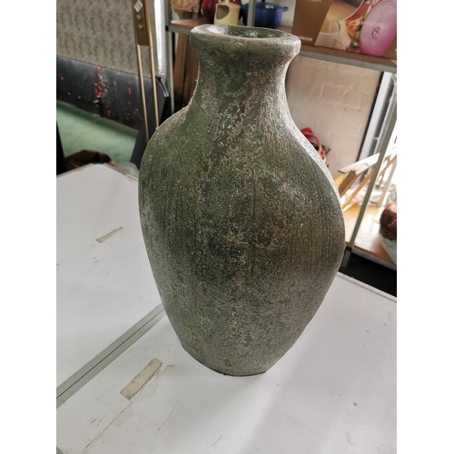 129 - Large terracotta green vase in good order height 50cm width 31cm