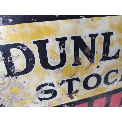 138 - Vintage double sided enamel sign Dunlop Stock reverse side has concrete stuck to the back in need of... 