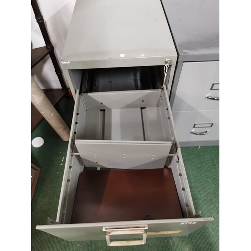 161 - Two drawer metal filing cabinet, in good order complete with key, has divisional dividers inside hei... 