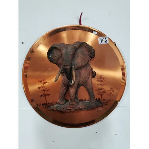 166 - Copper effect circular picture dipicting a 3D elephant with protruding tusks, signed to the bottom r... 