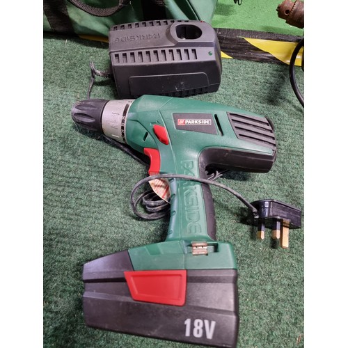 78 - Parkside 18 volt rechargeable drill complete with its charger and bag and a B&D hammer drill