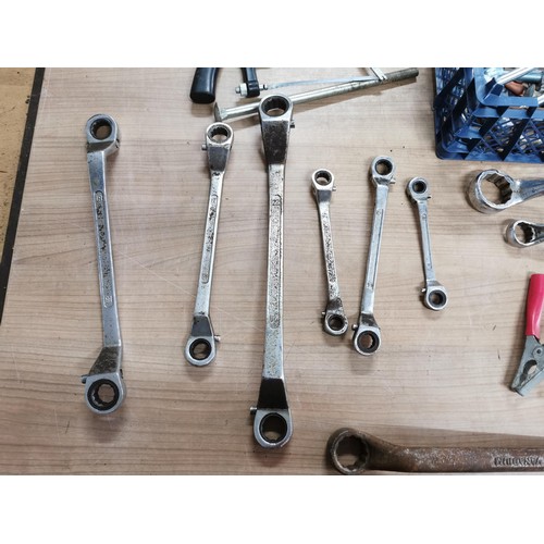 14 - Crate of spanners inc. ratchet type and various ring spanners etc