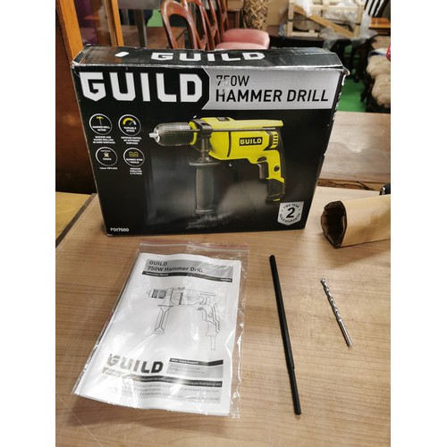 18 - Boxed Guild 750w 230v hammer drill in good working order complete with instruction and accessories