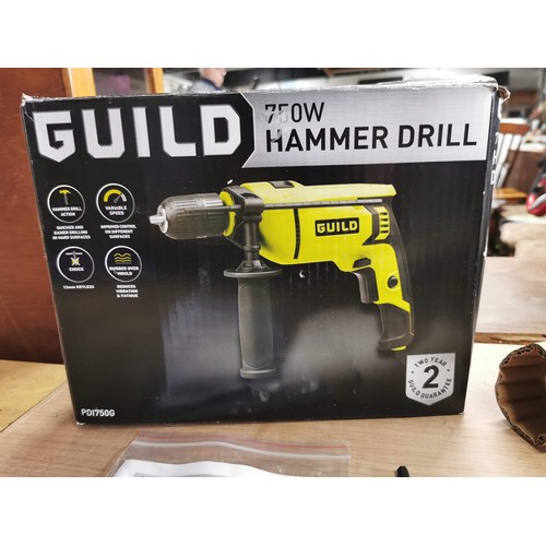 18 - Boxed Guild 750w 230v hammer drill in good working order complete with instruction and accessories