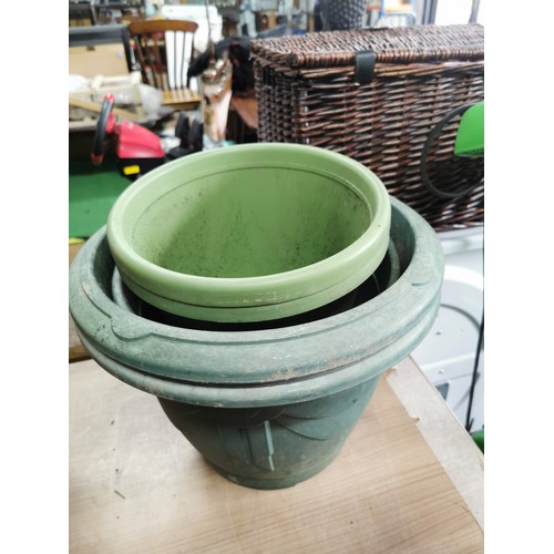 57 - Large collection of plastic planters of varying sizes all in good order, largest one measures 70cm d... 