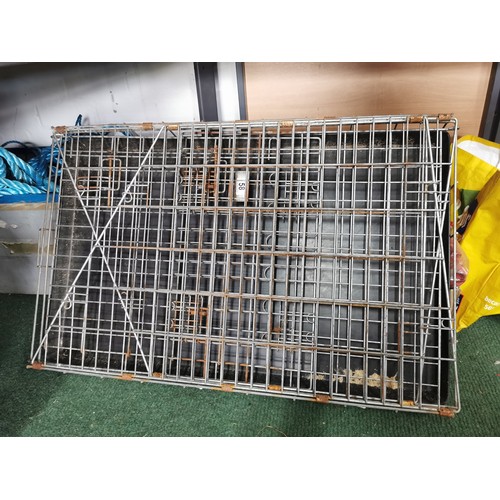 58 - Large metal dog cage in good order base size 90cm by 58cm