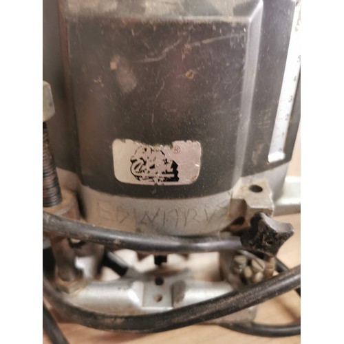 63 - Black and Decker woodworking DN66 Plunging Router complete with bench attachment