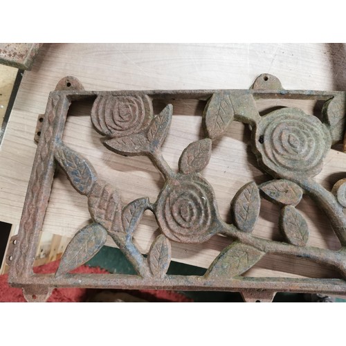 88 - Cast iron park bench with bench ends and ornate floral design back rest, length 112cm in good order,... 