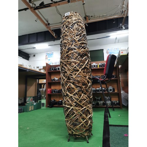 419 - Tall wicker formed lamp in working order very unusual