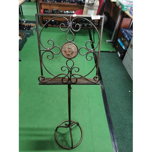 427 - Solid steel music stand with ornate detail to center and in good condition