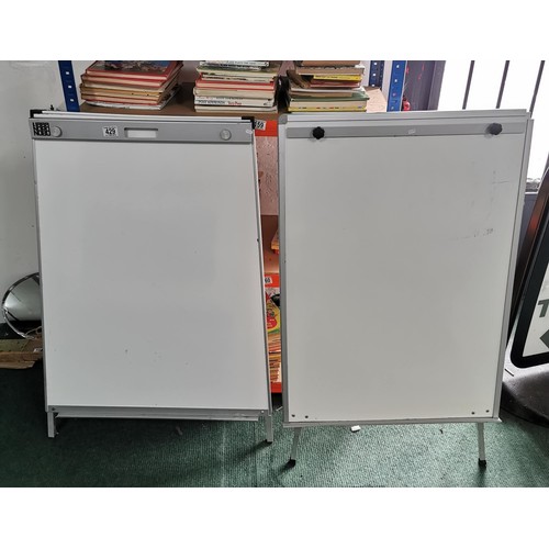 429 - 2 x white boards with adjustable legs