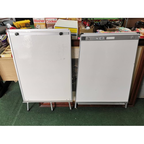 429 - 2 x white boards with adjustable legs