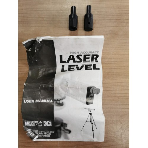 26 - Cased working laser level kit with instructions and spirit level and its tripod