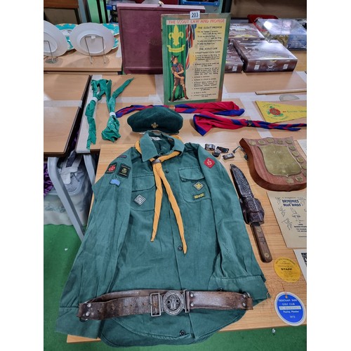 203 - A large collection of boys scout and girl guides items to include a vintage British scouts uniform c... 