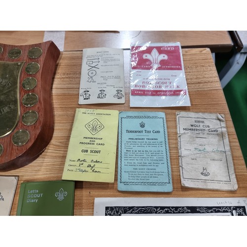 203 - A large collection of boys scout and girl guides items to include a vintage British scouts uniform c... 