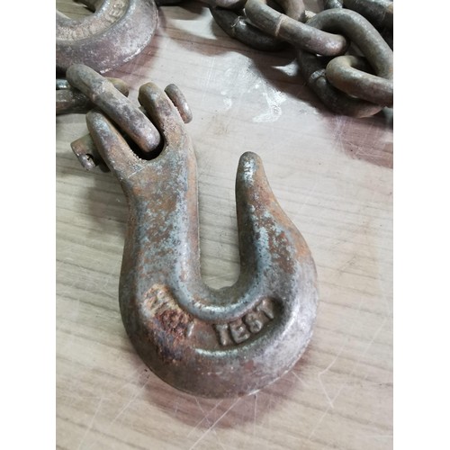 35 - Tractor link bar and a heavy duty chain and hook