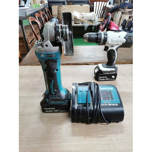 41 - Makita battery angle grinder with charger and a Makita 18v rechargeable drill