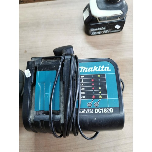 41 - Makita battery angle grinder with charger and a Makita 18v rechargeable drill