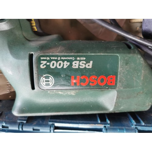 44 - cased Bosch mains drill with carry case and drill bits good working order with a new rivet gun and n... 