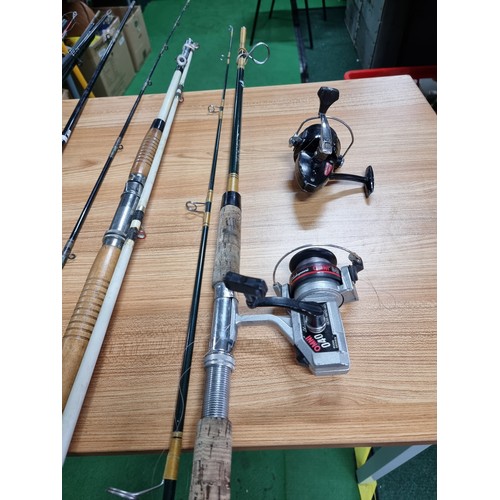 208 - A large quantity of various fishing rods and 2 fishing reels fitted in a good quality fishing rod ba... 