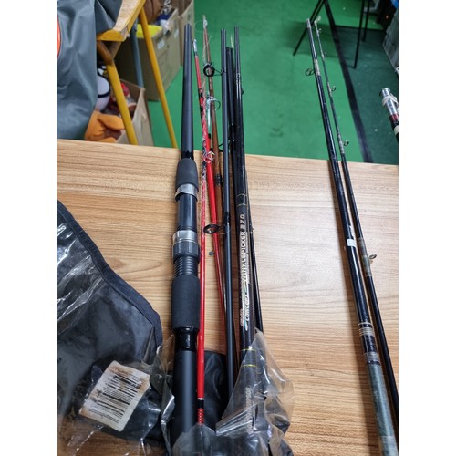 208 - A large quantity of various fishing rods and 2 fishing reels fitted in a good quality fishing rod ba... 