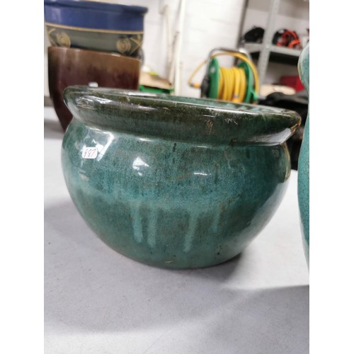 96 - 2x glazed stoneware planters in very good order largest measures 29cm high 36cm diameter
