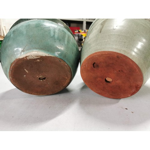 96 - 2x glazed stoneware planters in very good order largest measures 29cm high 36cm diameter
