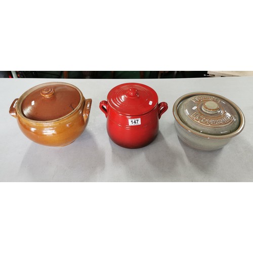 147 - 3x earthenware cassarole dishes inc a 4 pint dish all in good order, largest measures 18cm high by 2... 