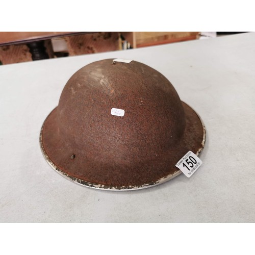 150 - British army WWII Brodie helmet in need of restoration